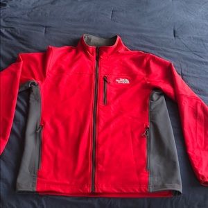 Men’s red North Face Wondbreaker